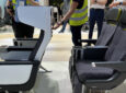 侧视图的新雷卡罗高级经济座位在AIX展示地板。如果航空公司愿意，这款座椅还可以配备大型隐私机翼。